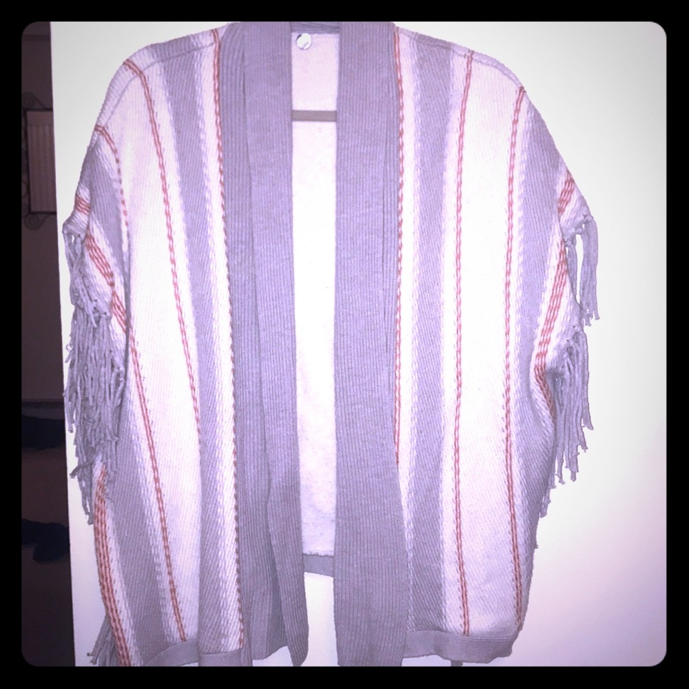 Margaret O’Leary short sleeve fringe poncho